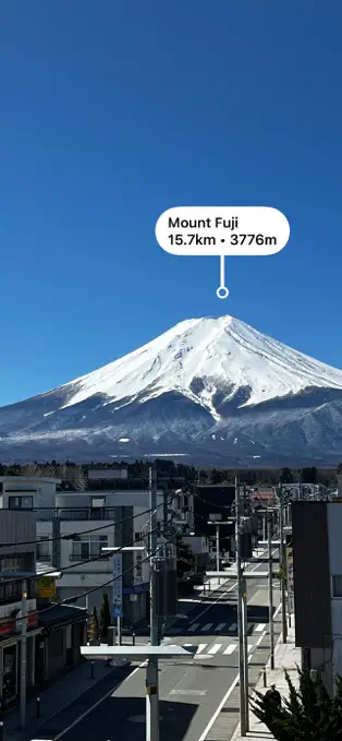 Mountain ID camera view labeling Mount Fuji with its distance and elevation